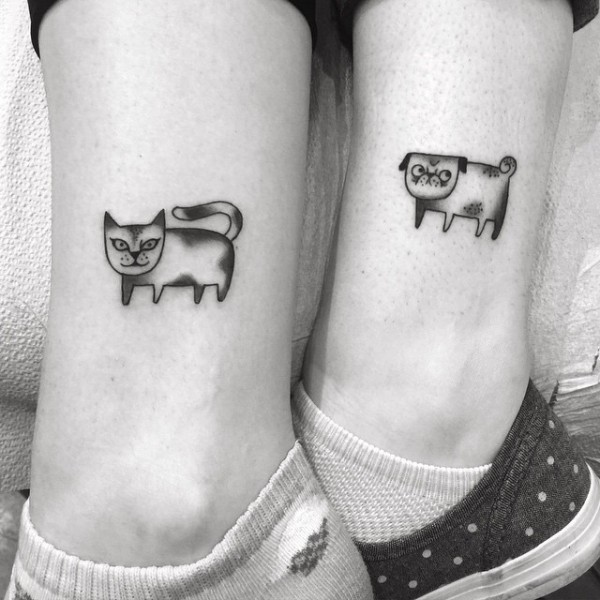 tatuagens de gato e cachorro