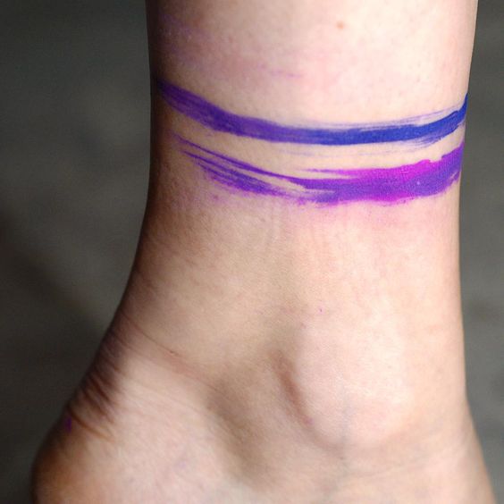 tatuagem de braçadeira de mancha de tinta