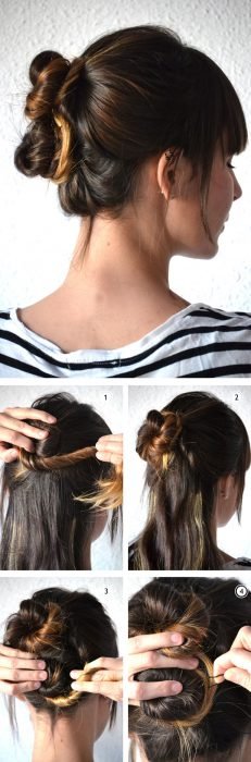 Menina fazendo um penteado com coque duplo no cabelo 
