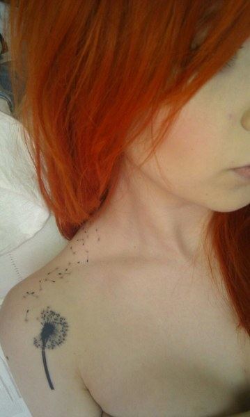 lion_tooth_clavicle_tattoo